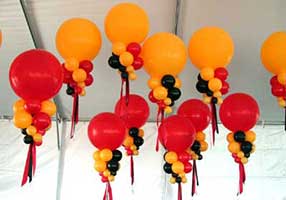 Giant Orange bubble decorations used to visually unify decor in a large tent venue