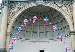 This 80 foot arch of balloon clusters frames a performance in Golden Gate Park in San Francisco.