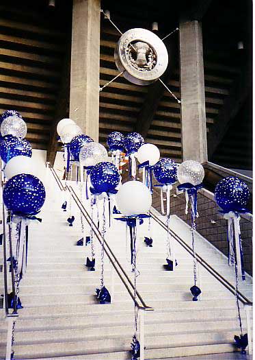 30 inch floating bubble balloons flanking entry stairs