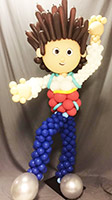 This four-foot high balloon sculpture of a boy in blue jeans and red balloon shirt is ready for fun with his 