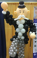 This six-foot high balloon sculpture of a classic Wall Street bank character 