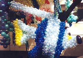A giant blue five foot high tropical fish balloon sculpture