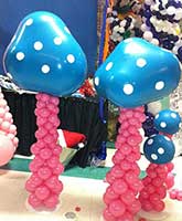 These four foot Balloonatics balloon magic mushrooms come in a variety of vivid colors