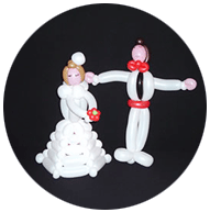 Minature bride and groom sculpted out of non-round balloons